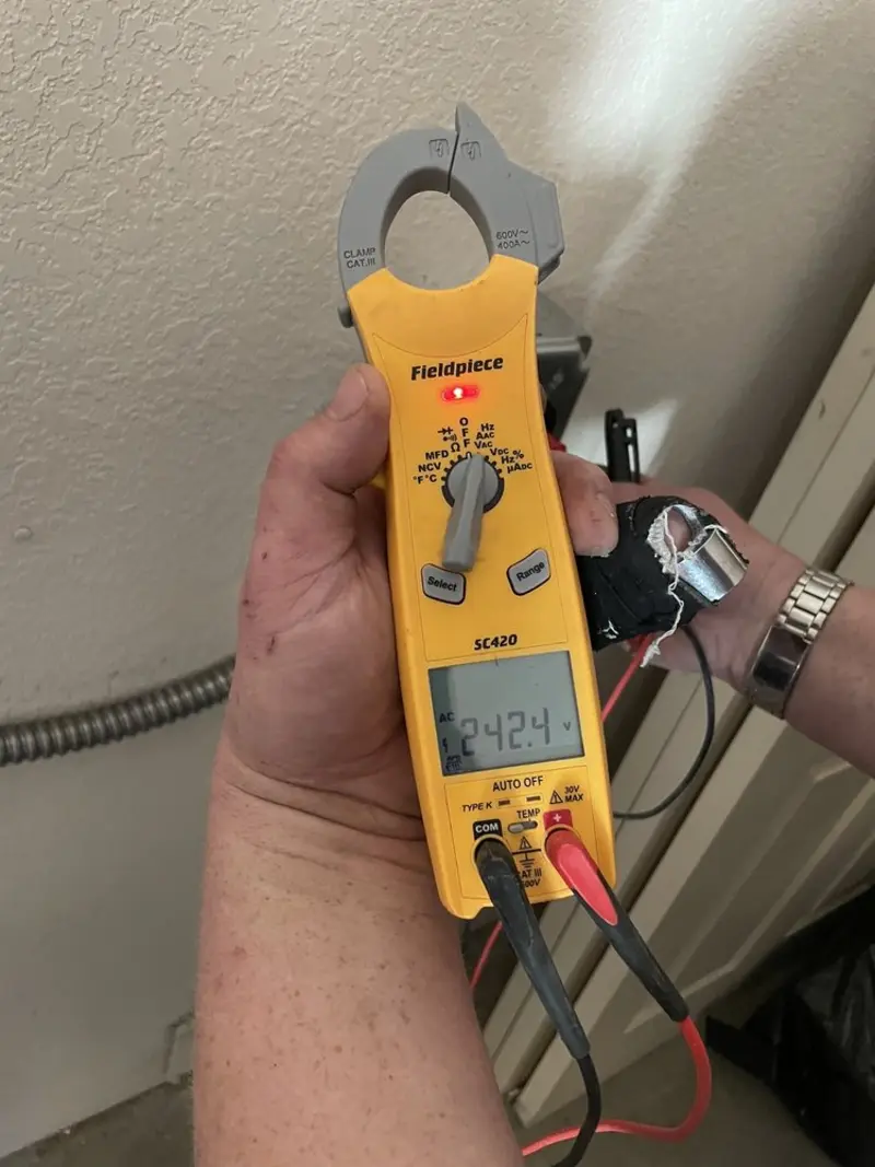 Voltage testing with clamp meter during Generator Installation in East Lyme